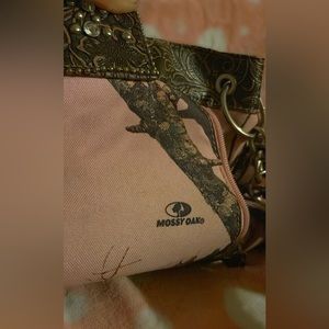 pink blinged out Mossy Oak purse.